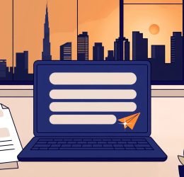Laptop showing a job email with a CV attachment beside Dubai’s skyline.